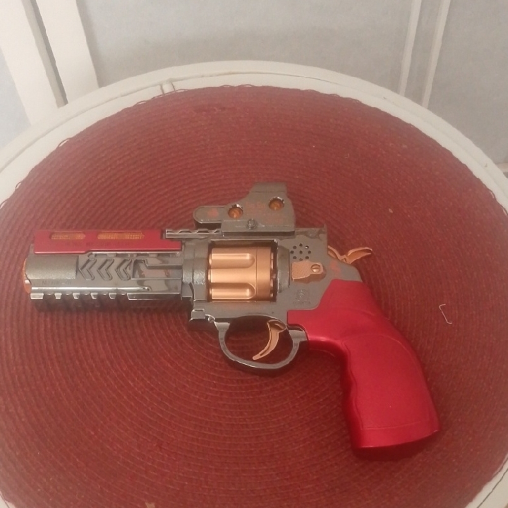 Red and Silver Toy Gun